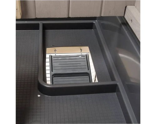 Detail van een douchebak met afvoer