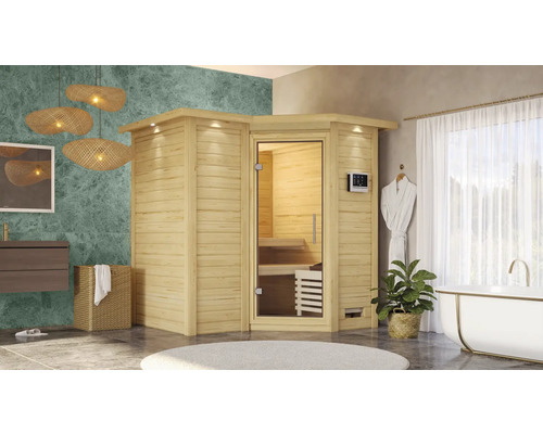 Badkamer met houten sauna, bad, wastafel en decoraties