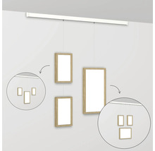 Fotoophangsysteem met meerdere frames die aan de muur hangen
