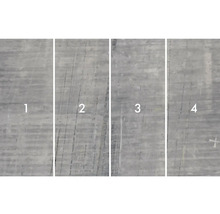 Close-up van vier betonnen platen met verschillende oppervlaktestructuren