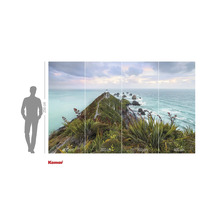 Fotobehang met vuurtoren, kustlandschap en planten