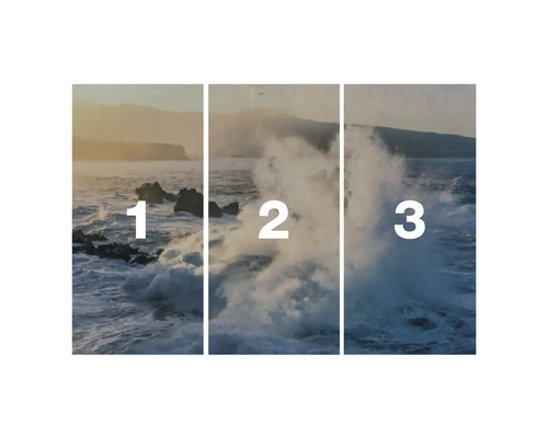 Driedelig beeld van golven die tegen rotsen slaan