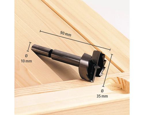 Forstnerboor op hout met afmetingen: diameter 35 millimeter, schachtdiameter 10 millimeter, totale lengte 90 millimeter.